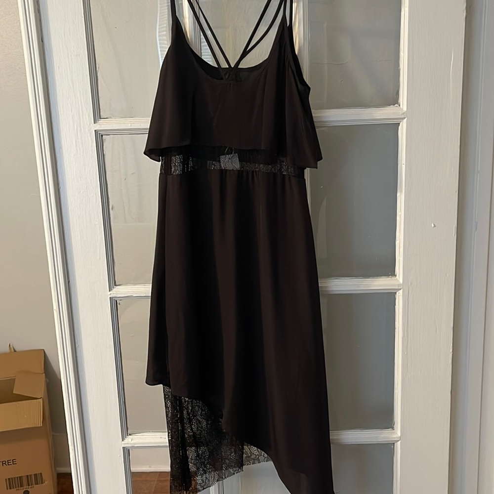 Black mid length dress with lace in mid section and bottom